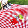 Plaid thickened waterproof outdoor picnic blanket.