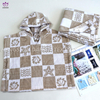 LL125 Printed hooded towel and bath towel.