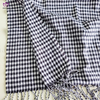 100% Acrylic plaid scarf.