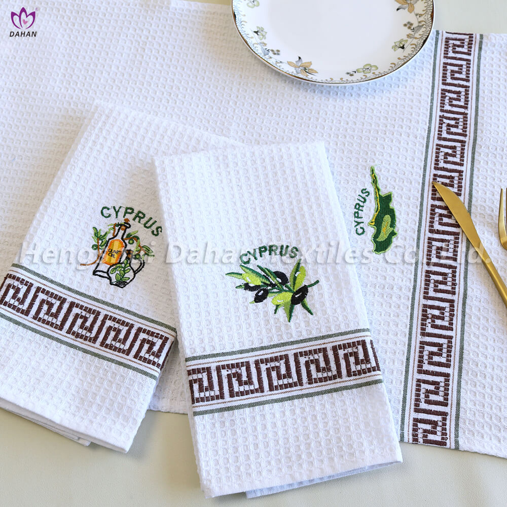 EM12 Embroidered tea towels.