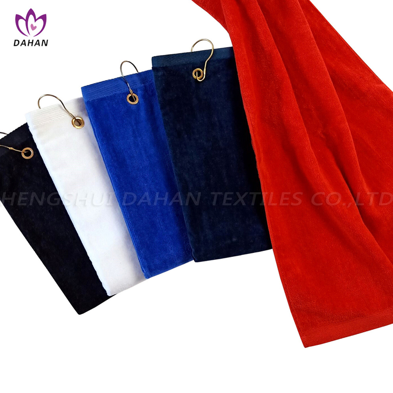 100% cotton solid color golf towel with a metal pothook.