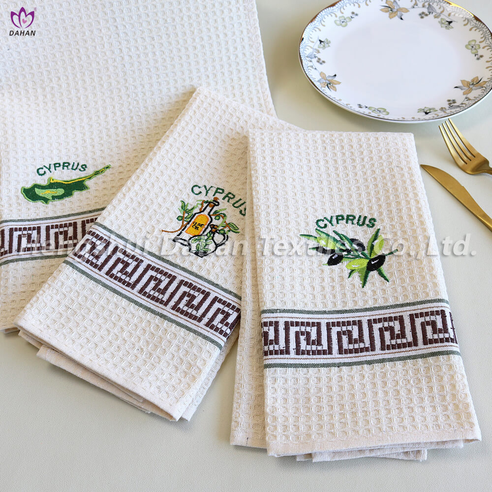 EM12 Embroidered tea towels.